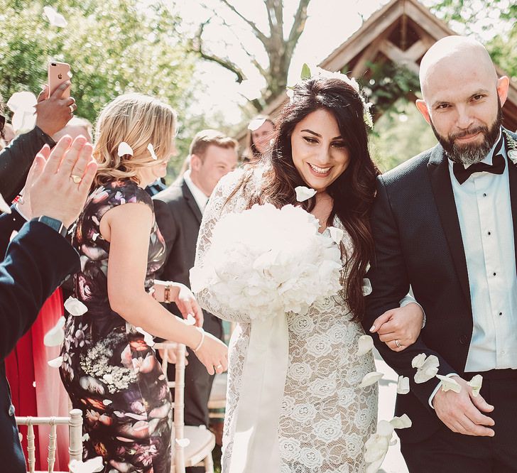 Bride in Grace Love Laces Wedding Dress | Groom in Tuxedo | Outdoor Wedding at Millbridge Court | Lemonade Pictures