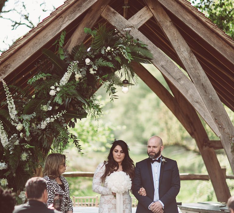 Bride in Grace Loves Lace Wedding Dress | Groom in Tuxedo | Lemonade Pictures