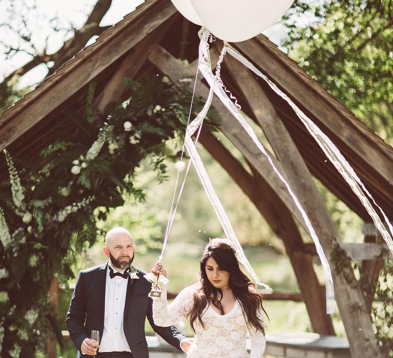 Bride in Grace Loves Lace Wedding Dress | Groom in Tuxedo | Giant Balloons | Lemonade Pictures