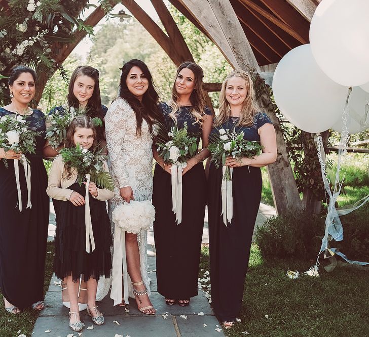 Bride in Grace Love Laces Wedding Dress | Bridesmaids in Navy ASOS Dresses | Outdoor Wedding at Millbridge Court | Lemonade Pictures