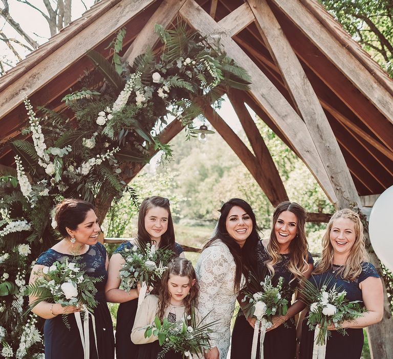 Bride in Grace Loves Lace Wedding Dress | Bridesmaids in Navy ASOS Dresses | Lemonade Pictures