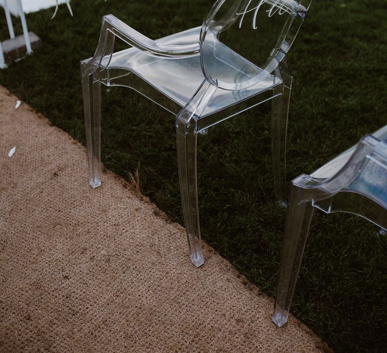 Ghost Chair Aisle Seats | Nocturn Wedding Inspiration Planned & Styled by The Little Lending Company | Florals by Swaffham Florist | Agnes Black Photography | Film by The Wilde Bride