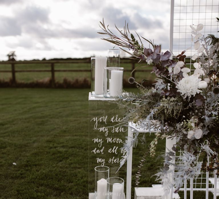 White & Grey Flowers by Swaffham Florist | Etched Perspex Altar Plinths | Nocturn Wedding Inspiration Planned & Styled by The Little Lending Company | Agnes Black Photography | Film by The Wilde Bride