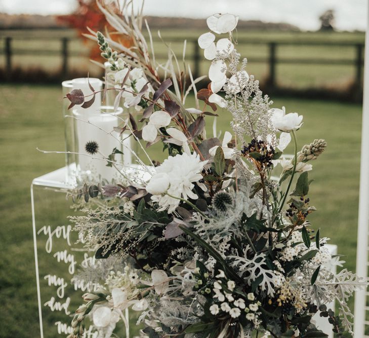 White & Grey Altar Floral Arrangement | Nocturn Wedding Inspiration Planned & Styled by The Little Lending Company | Florals by Swaffham Florist | Photography & Film by The Wilde Bride