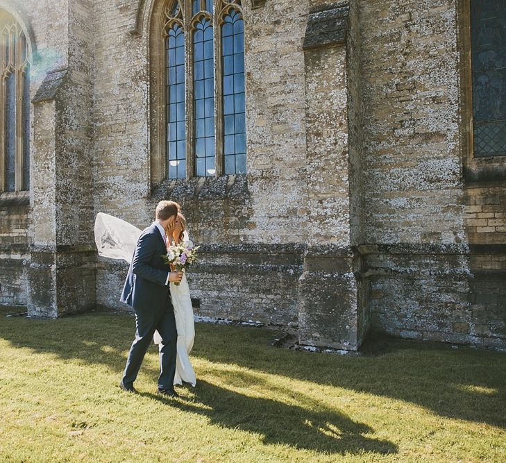 Bride in Pronovias Irune Gown & Groom in Hugo Boss Suit