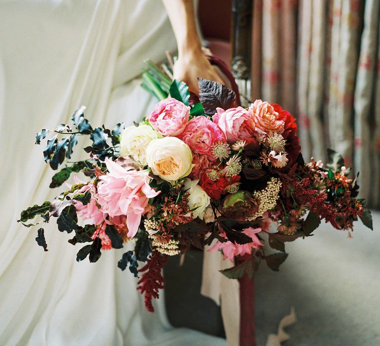 Red & Pink Bouquet by Martha & the Meadow | Opulent Wedding Inspiration at Warmwell House in Dorset with Rich colour Palette Planned by Kelly Chandler | Imogen Xiana Photography | Gorgeous Films