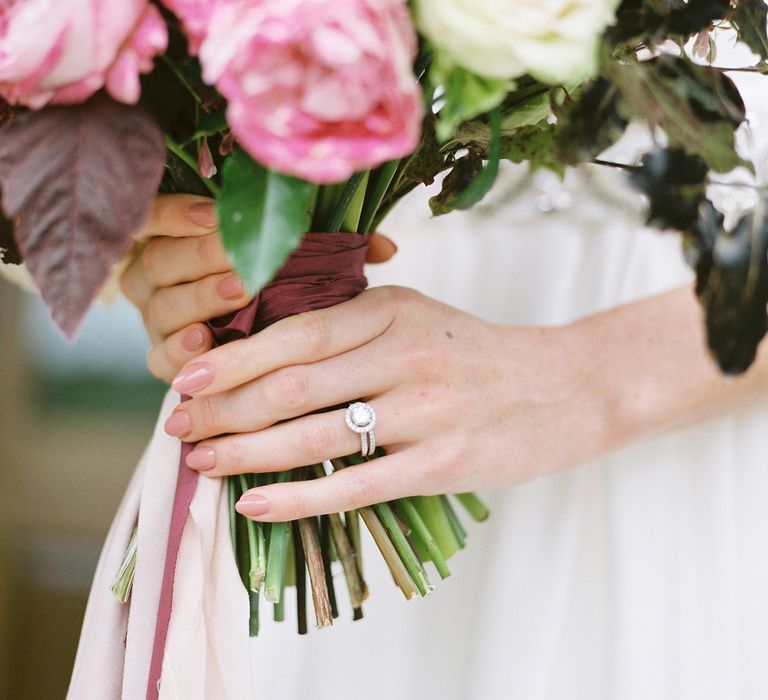 Red & Pink Bridal Bouquet by Martha & the Meadow | Opulent Wedding Inspiration at Warmwell House in Dorset with Rich colour Palette Planned by Kelly Chandler | Imogen Xiana Photography | Gorgeous Films