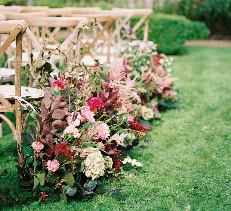 Rich Aisle Wedding Flowers by Martha & the Meadow | Opulent Wedding Inspiration at Warmwell House in Dorset with Rich colour Palette Planned by Kelly Chandler | Imogen Xiana Photography | Gorgeous Films