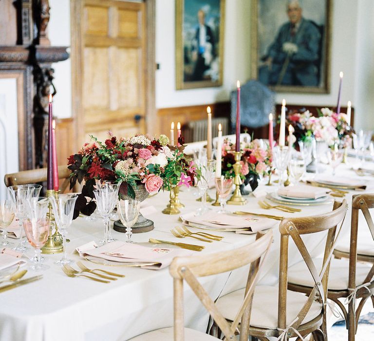 Rich Table Scape Decor with Taper Candles, Floral Centrepieces & Gold Cutlery | Opulent Wedding Inspiration at Warmwell House in Dorset with Rich colour Palette Planned by Kelly Chandler | Imogen Xiana Photography | Gorgeous Films