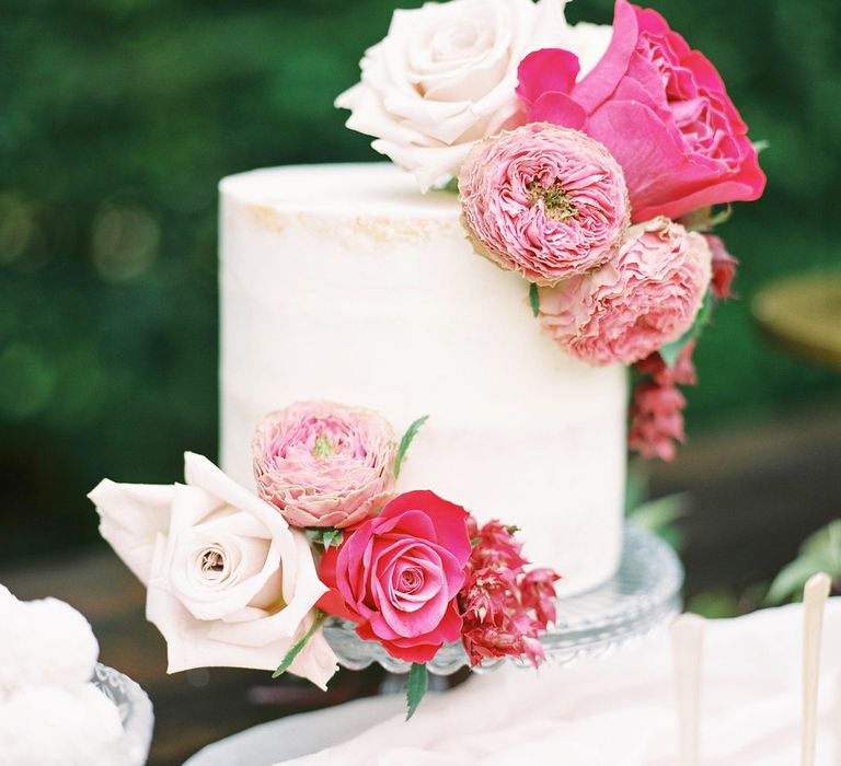 Iced Wedding Cake with Floral Decor by France Buns | Opulent Wedding Inspiration at Warmwell House in Dorset with Rich colour Palette Planned by Kelly Chandler | Imogen Xiana Photography | Gorgeous Films