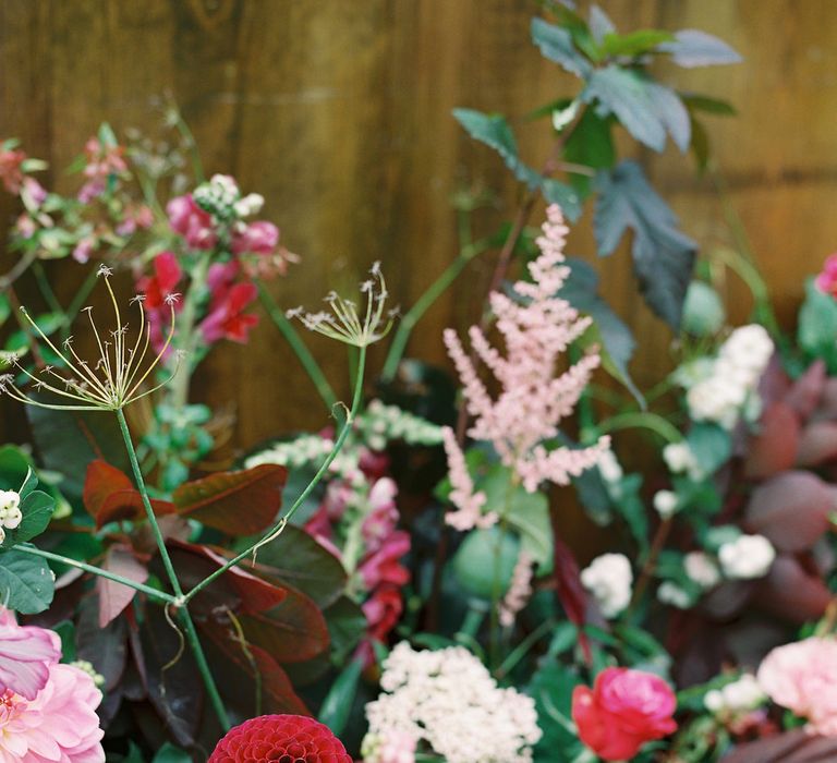 Rich Wedding Flowers by Martha & the Meadow | Opulent Wedding Inspiration at Warmwell House in Dorset with Rich colour Palette Planned by Kelly Chandler | Imogen Xiana Photography | Gorgeous Films