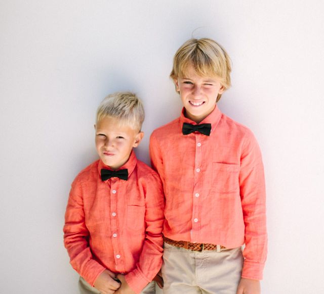 Page Boys in Coral Shirts & Black Bow Ties