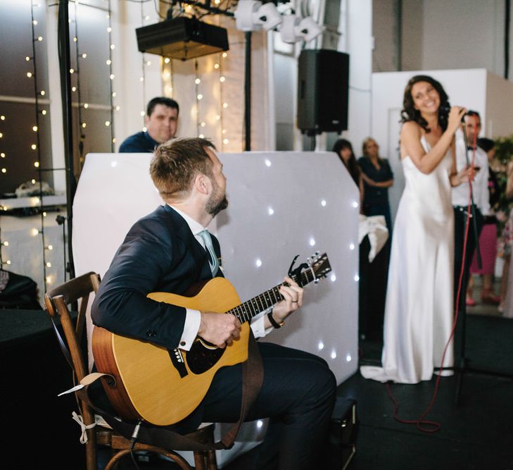 Bride & Groom Singing At Wedding // Trinity Buoy Wharf Wedding With Bride In Otaduy And Planning By Liz Linkleter Events Flowers By Grace And Thorn Images From My Beautiful Bride Photography