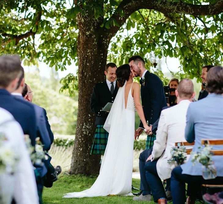 Bride in Phase Eight Wedding Dress | Groom in Tartan Kilt | Outdoor Wedding at Chateau Rigaud in France | Real Simple Photography | Yellow Gazelle Film