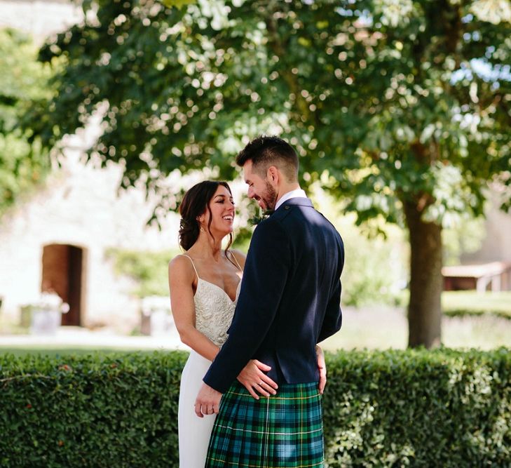 Bride in Phase Eight Wedding Dress | Groom in Tartan Kilt | Outdoor Wedding at Chateau Rigaud in France | Real Simple Photography | Yellow Gazelle Film