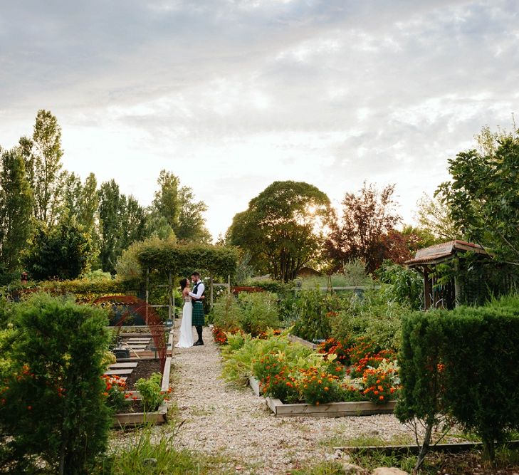 Bride in Phase Eight Wedding Dress | Groom in Tartan Kilt | Outdoor Wedding at Chateau Rigaud in France | Real Simple Photography | Yellow Gazelle Film