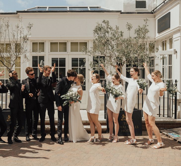 Bride In Sarah Seven Dress & Groom In All Black With Bridesmaids In White Shift Dresses And Foliage Decor With Images By Nataly J Photography