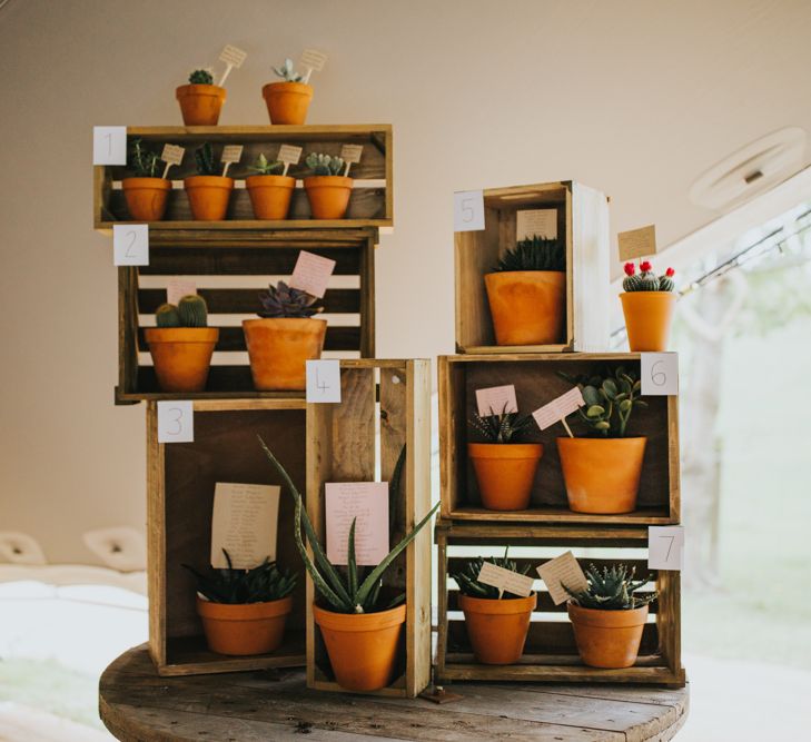 Terracotta Potted Plants in Wooden Crates Table Plan | 2 Day Festival Theme Wedding | Colin Ross Photography