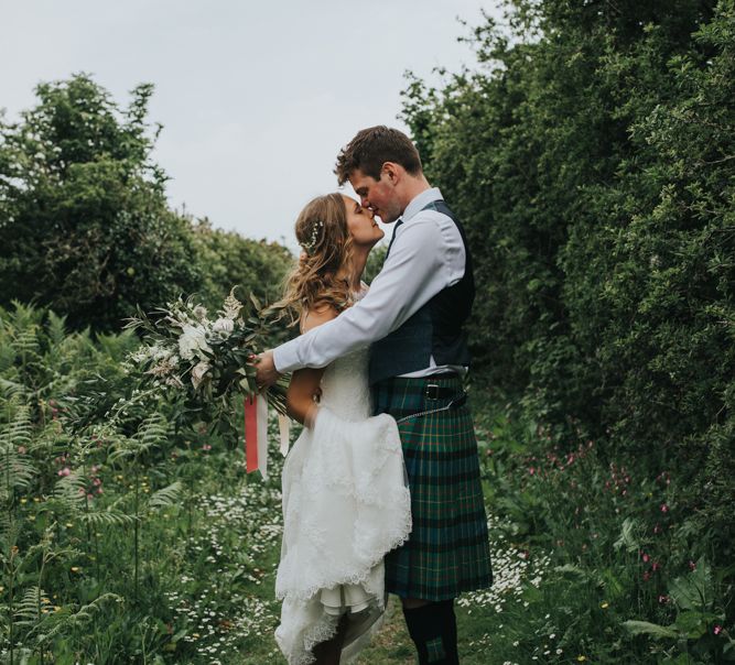 Bride in St Patrick Bridal Gown | Groom in Tartan Kilt | 2 Day Festival Theme Wedding | Colin Ross Photography