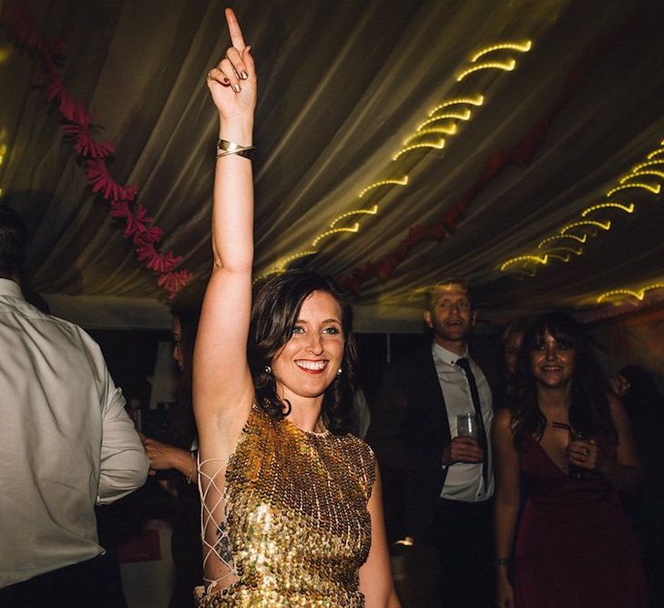 Bride In Gold Sequinned Dress