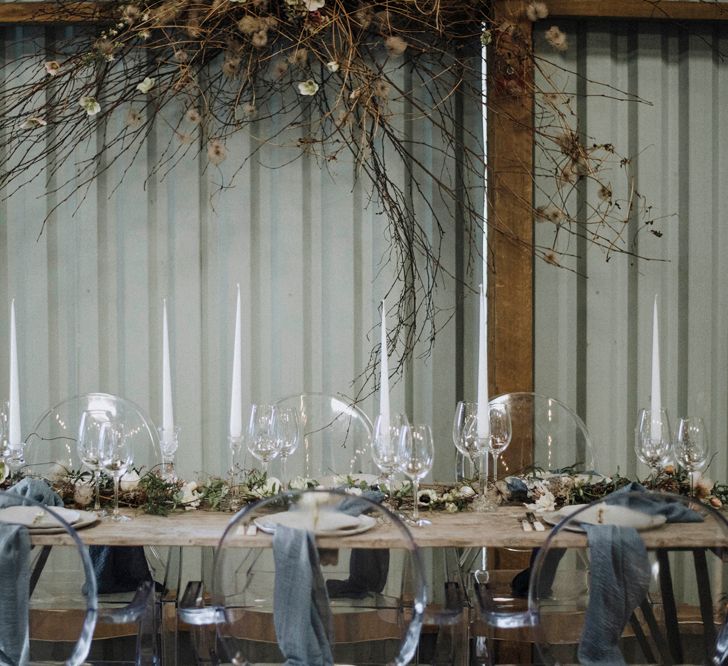 Tablescape with Flower Installation. Taper Candles and Ghost Chairs | Powder Blue Spring Wedding Inspiration Styled by The Little Lending Co | Megan Duffield Photography