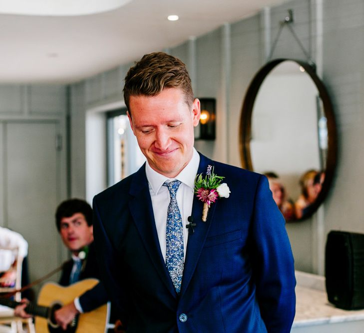 Groom at the Altar in Navy Ted Baker Suit | Colourful Coastal Wedding at The Gallivant in Camber Sands with DIY Decor | Epic Love Story Photography