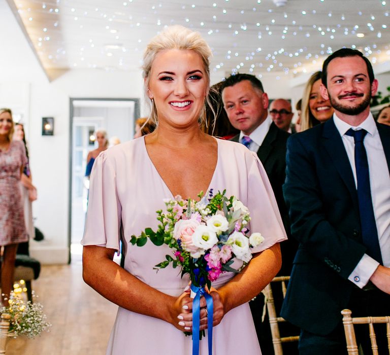 Bridesmaid in Blush ReWritten Wrap Dress | Colourful Coastal Wedding at The Gallivant in Camber Sands with DIY Decor | Epic Love Story Photography