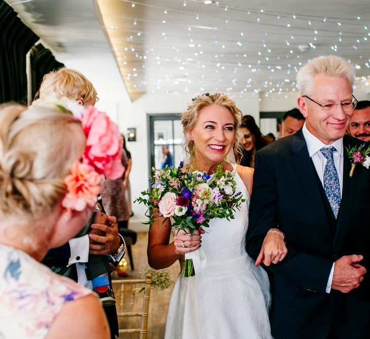 Wedding Ceremony | Bridal Entrance in Jesus Peiro Wedding Dress | Colourful Coastal Wedding at The Gallivant in Camber Sands with DIY Decor | Epic Love Story Photography