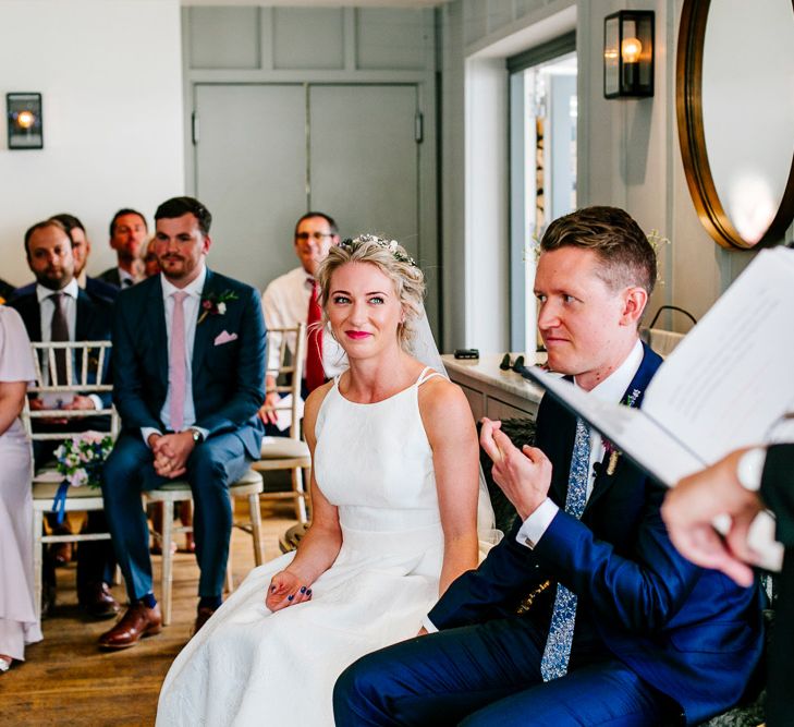 Wedding Ceremony | Bride in Jesus Peiro Wedding Dress | Groom in Navy Ted Baker Suit | Colourful Coastal Wedding at The Gallivant in Camber Sands with DIY Decor | Epic Love Story Photography