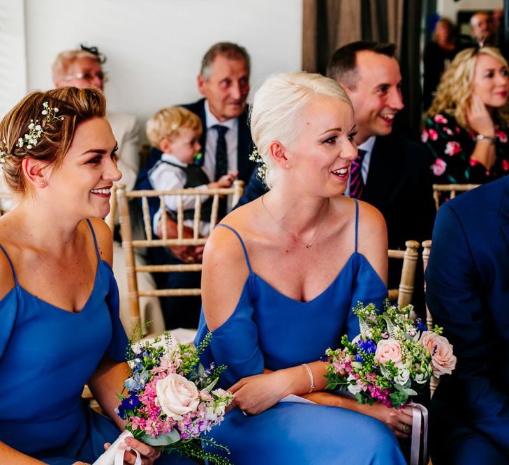 Bridesmaids in Blue ReWritten Cold Shoulder Dresses | Colourful Coastal Wedding at The Gallivant in Camber Sands with DIY Decor | Epic Love Story Photography