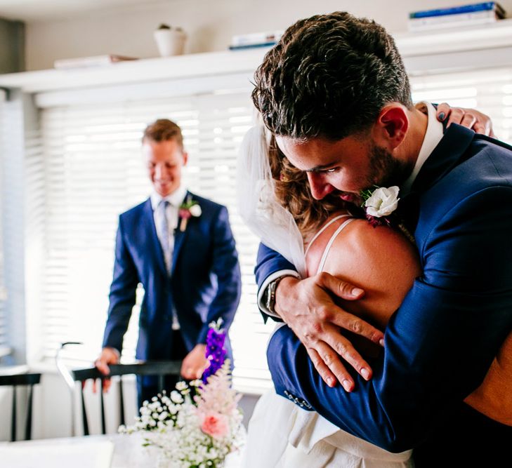 Wedding Ceremony | Bride in Jesus Peiro Wedding Dress | Groom in Navy Ted Baker Suit | Colourful Coastal Wedding at The Gallivant in Camber Sands with DIY Decor | Epic Love Story Photography