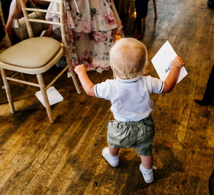 Wedding Ceremony | Page Boy in Shorts & Braces | Colourful Coastal Wedding at The Gallivant in Camber Sands with DIY Decor | Epic Love Story Photography