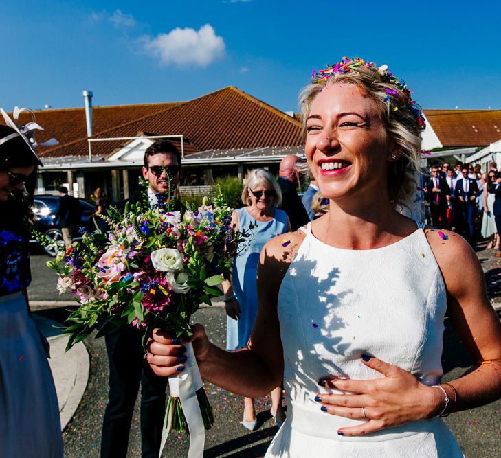 Wedding Ceremony | Bride in Jesus Peiro Wedding Dress | Colourful Coastal Wedding at The Gallivant in Camber Sands with DIY Decor | Epic Love Story Photography