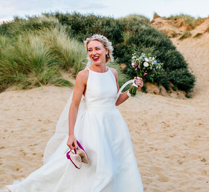 Beach Portrait | Bride in Jesus Peiro Gown | Colourful Coastal Wedding at The Gallivant in Camber Sands with DIY Decor | Epic Love Story Photography