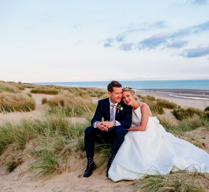 Beach Portrait | Bride in Jesus Peiro Gown | Groom in Navy Ted Baker Suit | Colourful Coastal Wedding at The Gallivant in Camber Sands with DIY Decor | Epic Love Story Photography