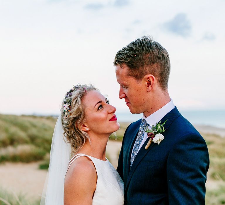 Beach Portrait | Bride in Jesus Peiro Gown | Groom in Navy Ted Baker Suit | Colourful Coastal Wedding at The Gallivant in Camber Sands with DIY Decor | Epic Love Story Photography