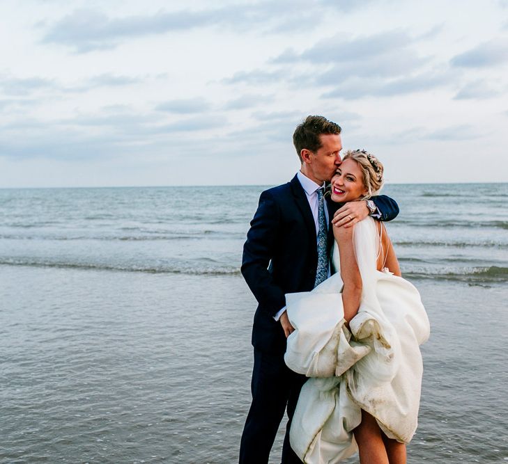 Beach Portrait | Bride in Jesus Peiro Gown | Groom in Navy Ted Baker Suit | Colourful Coastal Wedding at The Gallivant in Camber Sands with DIY Decor | Epic Love Story Photography