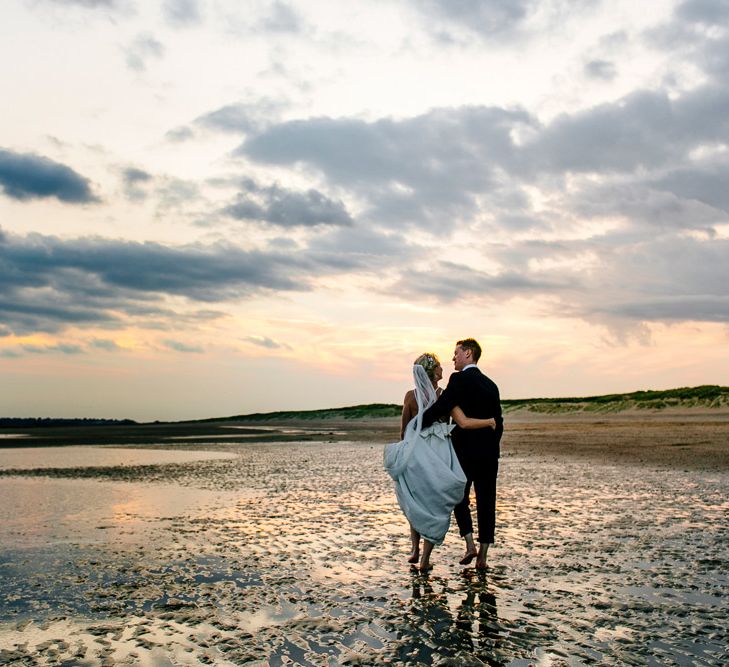 Beach Portrait | Bride in Jesus Peiro Gown | Groom in Navy Ted Baker Suit | Colourful Coastal Wedding at The Gallivant in Camber Sands with DIY Decor | Epic Love Story Photography