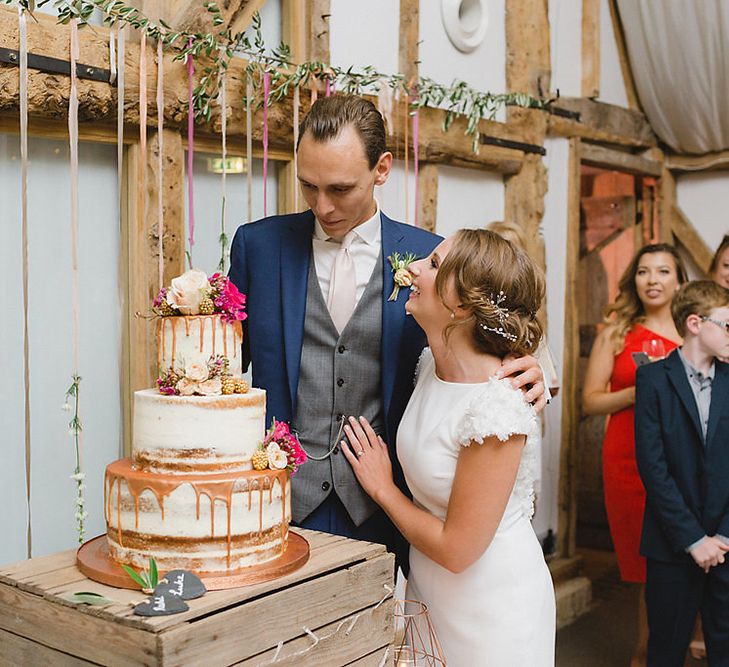 Cutting The Wedding Cake // South Farm Wedding Planned & Styled By Mirabella Weddings With Bride In Pronovias And Florals By Lily And May With Images From Photography By Bea