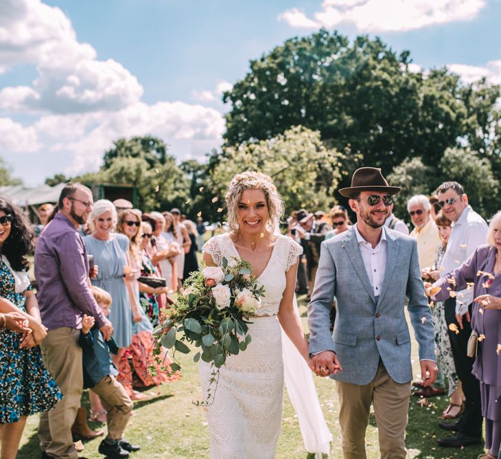 Bride in Daughters of Simone Wedding Dress