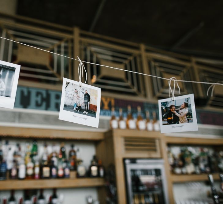 Polaroid Picture Bunting | Bright Wedding at The Oyster Shed in London | Chris Barber Photography