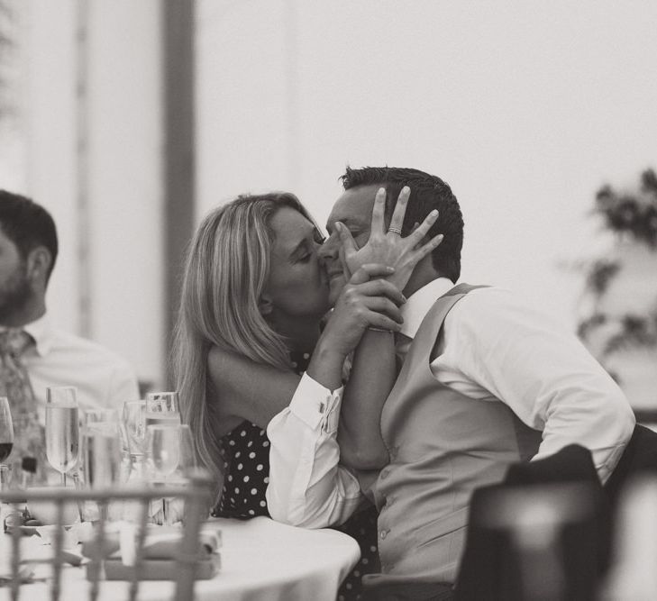 Wedding Guests Kissing