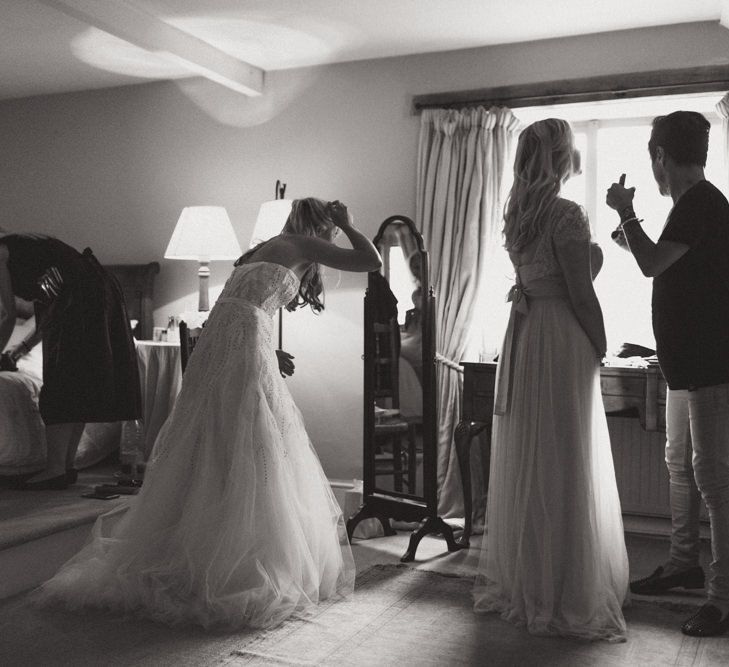 Bridal Preparations with Bride in Monique Lhuillier Candy Wedding Dress