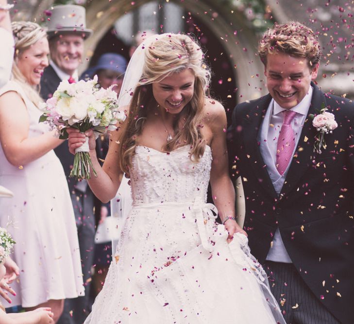 Church Exit Confetti Moment with Bride in Monique Lhuillier Candy Wedding Dress