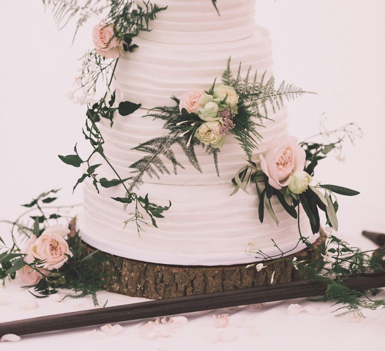 Frosted Wedding Cake with Flower Decor