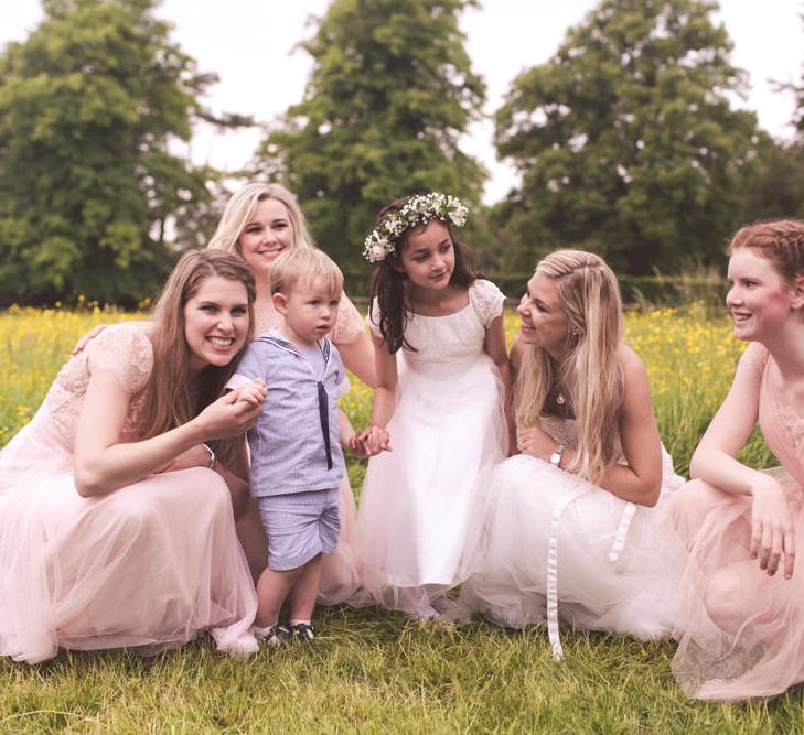 Bride in Monique Lhuillier Candy Wedding Dress & Bridesmaids in Pink BHLDN Dresses