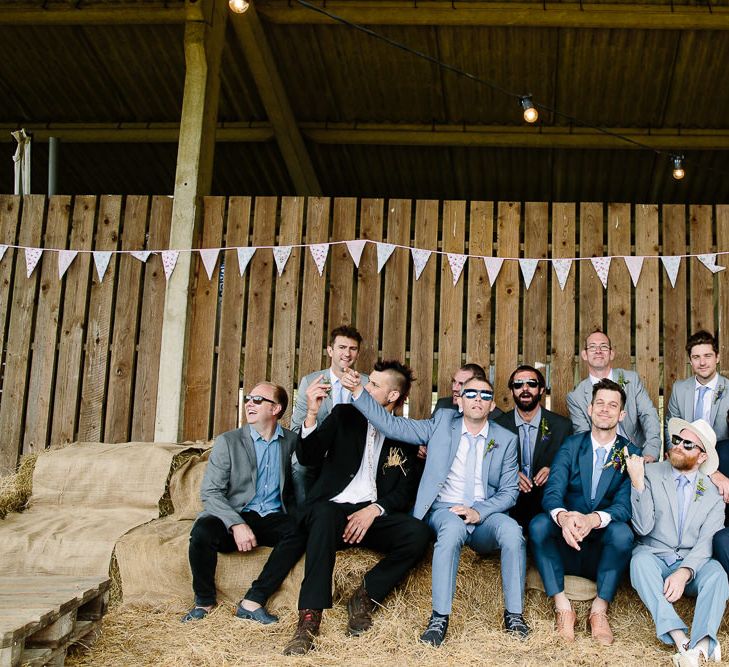 Groom in Teal Paul Smith Suit & Groomsmen in Topman Suits