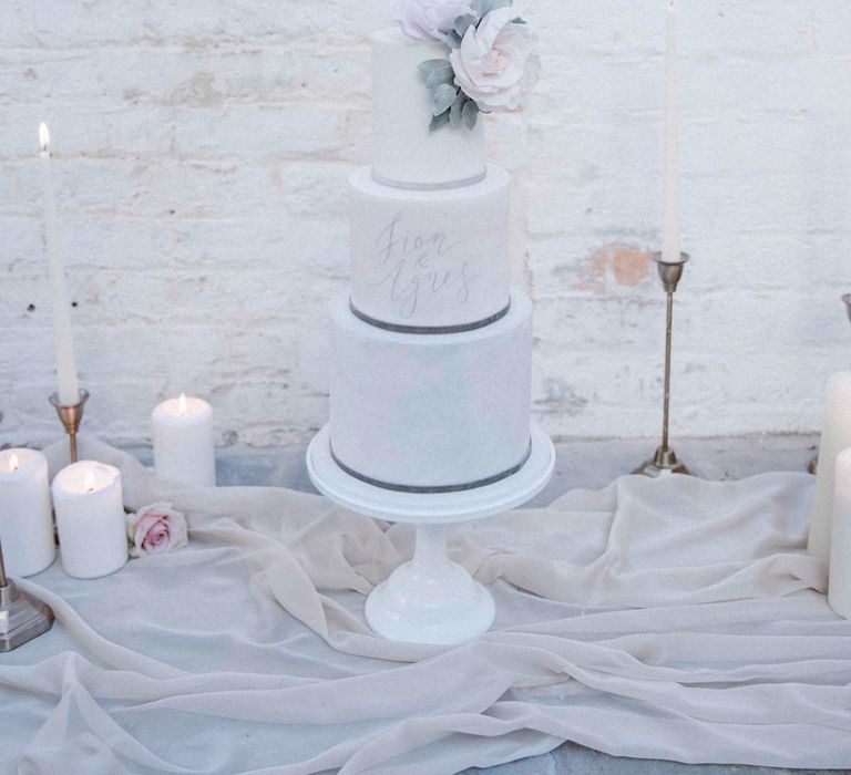 White Wedding Cake With Pale Pink Icing