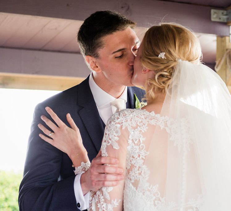 Outdoor Wedding Ceremony | Bride in Mori Lee Lace Dress | Groom in Navy Reiss Suit | Turner & Moss Photography