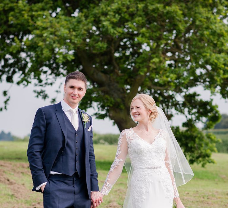 Mori Lee Lace Bridal Gown | Groom in Navy Reiss Suit | Turner & Moss Photography